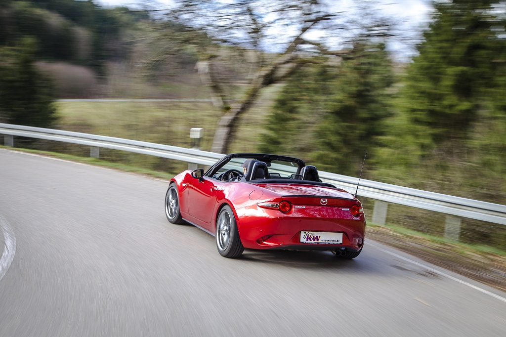 KW coilovers in a driving Mazda MX5